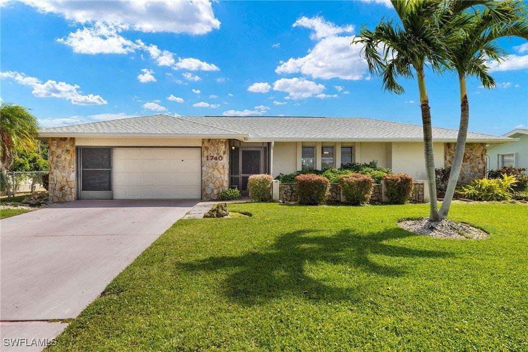 Wake Up to Paradise in This Exquisite Sailboat-access Waterfront Home