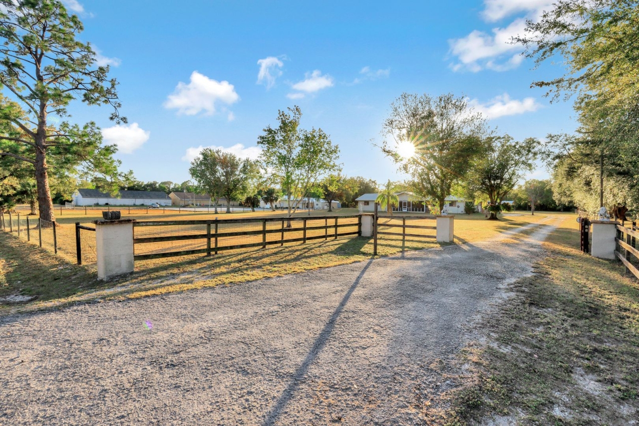Gated entrance to property with keypad.